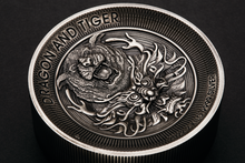 Load image into Gallery viewer, Dragon and Tiger 2022 2 Kilo 9999 Silver Antiqued High Relief $60 Coin 200-mtg